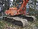 1986 Atlas  1404 LC 80 pan shovel mud chains Construction machine Caterpillar digger photo 1