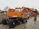 1985 Atlas  1302 E with gripper Construction machine Mobile digger photo 1