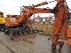 1985 Atlas  1302 E with gripper Construction machine Mobile digger photo 3
