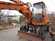 1985 Atlas  1302 E with gripper Construction machine Mobile digger photo 7