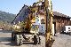 1993 Atlas  Mobile excavator 1404 model 1993 with rotating boom Construction machine Mobile digger photo 1
