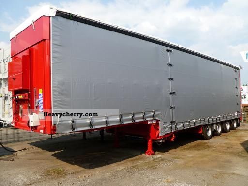 2011 Dinkel  4-axis-jumbo Semi-trailer Low loader photo