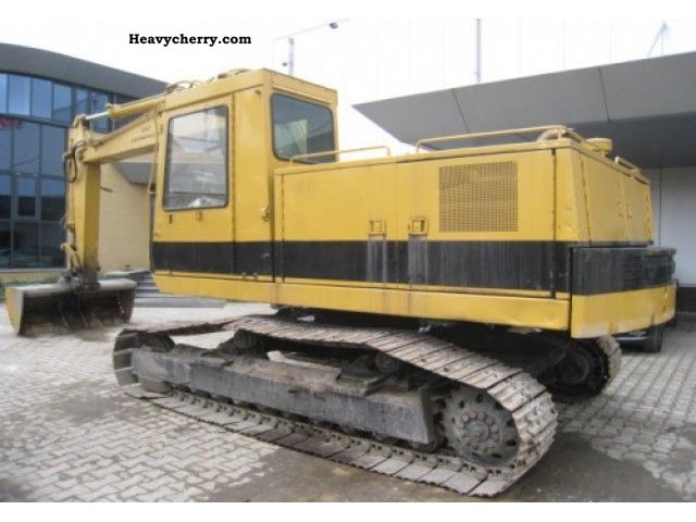 1984 CAT  215B Construction machine Caterpillar digger photo