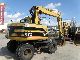 2000 CAT  M 312 Construction machine Mobile digger photo 2