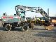 2000 CAT  M 318 m. Shield clamps + / + blade stabilizers Construction machine Mobile digger photo 1