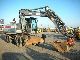 2000 CAT  M 318 m. Shield clamps + / + blade stabilizers Construction machine Mobile digger photo 4