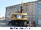 1998 CAT  M 318 Construction machine Mobile digger photo 1