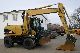 2007 CAT  M 313 C - shield, hydr. Boom - 30 km / h Construction machine Mobile digger photo 1