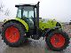 2011 Claas  ARION 610C Agricultural vehicle Tractor photo 4