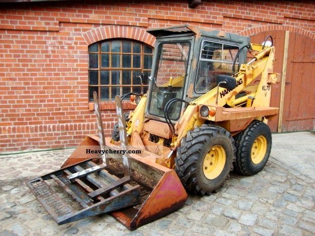 1994 Hanomag  Skid Steer KL compakt 3to 75. Pallet fork Construction machine Mini/Kompact-digger photo
