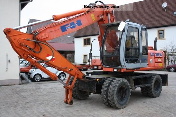 1999 Hitachi  EX 165 W Construction machine Mobile digger photo