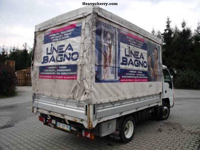 Isuzu NPR 55 G - PLANE 2001 Stake body and tarpaulin Truck Photo and Specs