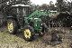1985 John Deere  1640 4x4 with FRONTLADER 1985r. Agricultural vehicle Tractor photo 1