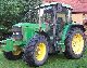 John Deere  6310 SE 2001 Tractor photo