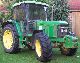 2001 John Deere  6310 SE Agricultural vehicle Tractor photo 1