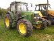 1999 John Deere  6810 Agricultural vehicle Tractor photo 1