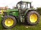 1999 John Deere  6910 Agricultural vehicle Tractor photo 1