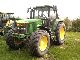 1999 John Deere  6910 Agricultural vehicle Tractor photo 2
