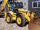 2004 Komatsu  WB97S Construction machine Mobile digger photo 1