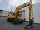 Komatsu  PW 130-7K including shield + claw, spoon grave! 2005 Mobile digger photo