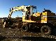 1980 Liebherr  911C, with grippers, Tiflöffel, heater Construction machine Mobile digger photo 1