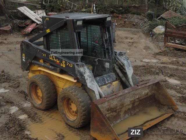 2005 New Holland  LS170-2005-USA-MIXER + + HAMMER 4X4 BACKHOE BUCKET- Construction machine Wheeled loader photo