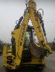 2006 New Holland  LB 115 Construction machine Mobile digger photo 3