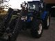 2006 New Holland  TL 100 A Agricultural vehicle Tractor photo 1