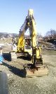 New Holland  E 215 LC / w 3 buckets 2005 Mobile digger photo