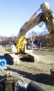 2005 New Holland  E 215 LC / w 3 buckets Construction machine Mobile digger photo 1