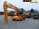 New Holland  MH 5.6 / CASE WX 185 4x Staff 2009 Mobile digger photo