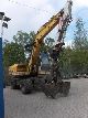O & K  MH5 PMS with gripper 1990 Mobile digger photo