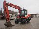 1997 O & K  MH Plus Series B, Lehnhoff MS 10, bucket, Construction machine Mobile digger photo 1