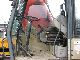 1997 O & K  MH with outriggers 6 4 Construction machine Mobile digger photo 11