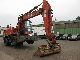 O & K  MH with outriggers 6 4 1997 Mobile digger photo