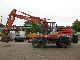 1997 O & K  MH with outriggers 6 4 Construction machine Mobile digger photo 2