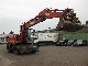 1997 O & K  MH with outriggers 6 4 Construction machine Mobile digger photo 6