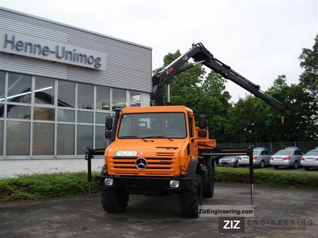 2010 Unimog  U 4000 with crane Hiab 111 BS-2 Duo Truck over 7.5t Truck-mounted crane photo
