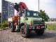 2009 Unimog  U 5000 with Palfinger PK 23002 E Truck over 7.5t Three-sided Tipper photo 2