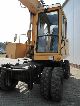 1991 CAT  212 BFT wheel excavator Construction machine Mobile digger photo 5