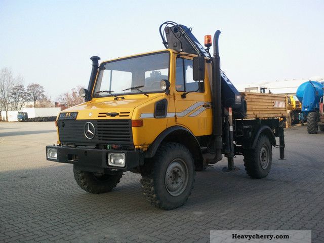 1991 Unimog  427/11 4x4 with crane Van or truck up to 7.5t Stake body photo