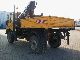 1991 Unimog  427/11 4x4 flatbed with crane Truck over 7.5t Stake body photo 2