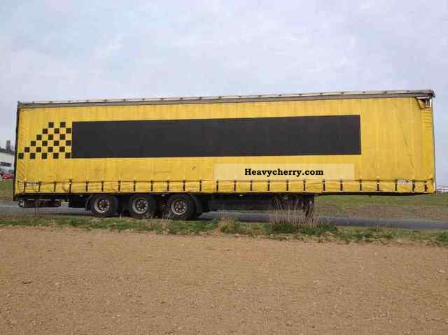2001 Kotschenreuther  MEGA Semi-trailer Stake body and tarpaulin photo