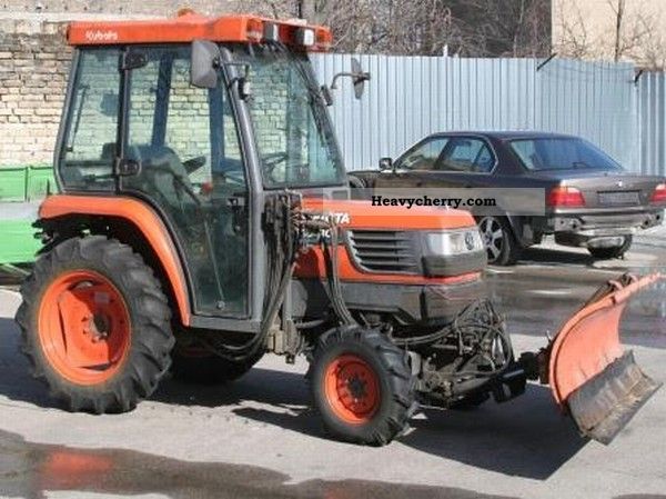 2001 Kubota  ST30 with brush and blade Agricultural vehicle Tractor photo