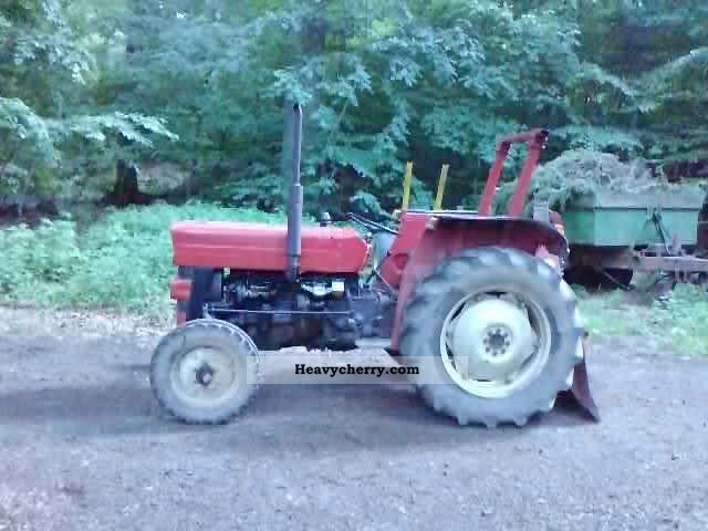 2011 Massey Ferguson  135 Agricultural vehicle Tractor photo