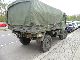 1986 Mercedes-Benz  Unimog 1300 4x4 army tarpaulin bows Van or truck up to 7.5t Stake body and tarpaulin photo 2