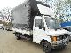 1988 Mercedes-Benz  407 D dual wheel Van or truck up to 7.5t Stake body and tarpaulin photo 1