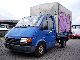 Ford  Transit 100 flatbed 1990 Stake body and tarpaulin photo