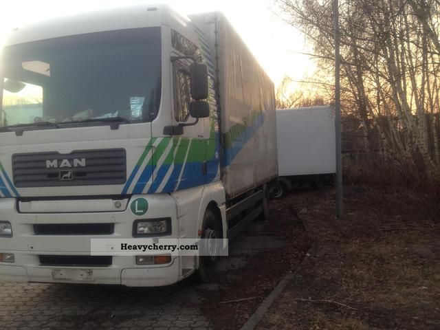 2002 MAN  18.410 TGA climate Truck over 7.5t Stake body and tarpaulin photo