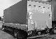 2001 MAN  LE 220 B liftgate Truck over 7.5t Stake body and tarpaulin photo 1
